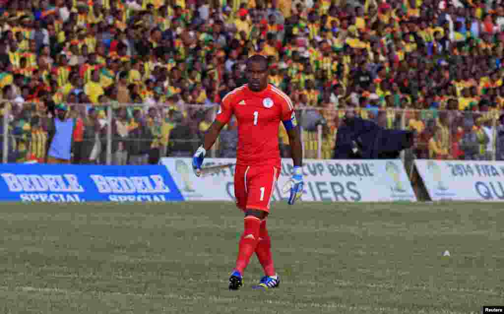 Nigeria goalkeeper Enyeama leaves the field after beating Ethiopia 2 -1 in their 2014 World Cup qualifying match.