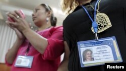 Sex workers, who are also licensed to facilitate in judicial proceedings, take part in an event to commemorate International Sexual Worker Day, in Managua, June 2, 2015.