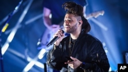 Recording artist The Weeknd performs at the 2015 Billboard Hot 100 Music Festival at Nikon at Jones Beach Theater on Aug. 22, 2015, in Wantagh, New York.