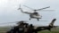FILE - A World Food Programme (WFP) helicopter takes off, in Beira, Mozambique, March 22, 2019. 