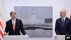 Secretary of State John Kerry, left, speaks at a news conference with Albanian Prime Minister Edi Rama in capital Tirana, Feb. 14, 2016. 