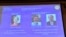 Pictures of the 2018 Nobel Prize laureates for chemistry: Frances H. Arnold of the United States, George P. Smith of the United States and Gregory P. Winter of Britain are displayed on a screen during the announcement at the Royal Swedish Academy of Scien