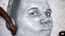 En la imagen, un dibujo del joven Michael Brown.