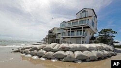 Sandbags surround homes on North Topsail Beach, N.C., Sept. 12, 2018, as Hurricane Florence threatens the coast.