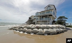 Sandbags surround homes on North Topsail Beach, N.C., Sept. 12, 2018, as Hurricane Florence threatens the coast.