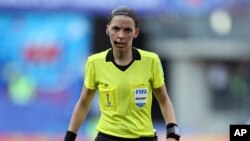 FILE - Referee Stéphanie Frappart of France during the of the Women's World Cup quarterfinal soccer match between Germany and Sweden at Roazhon Park in Rennes, France, June 29, 2019. 