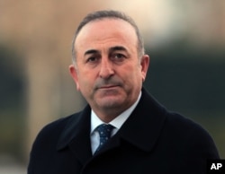 Turkish Foreign Minister Mevlut Cavusoglu during a ceremony in Ankara, Turkey, Dec. 10, 2015. He said Turkey wanted to overcome tensions with Russia but said Moscow was using "every opportunity" to hit at Turkey.