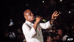 Democratic Republic of Congo joint opposition presidential candidate Martin Fayulu delivers a speech in front of his supporters in Beni, Dec. 5, 2018.