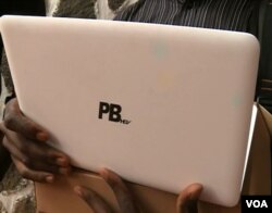 One of 500,000 laptops Cameroon's government says it hopes to distribute to university students by April of 2018. All of the computers bear the letters PB HEV, short for Paul Biya, Higher Education Vision. (M. Kindzeka/VOA)