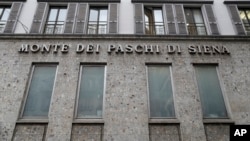 The facade of a branch of the ' Monte Dei Paschi di Siena ' bank in Milan, Italy, Dec. 19, 2016. 