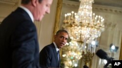 El primer ministro británico, David Cameron, durante una conferencia conjunta en la Casa Blanca, junto al presidente Barack Obama.