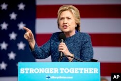 Democratic presidential candidate Hillary Clinton speaks at a rally at NewBo City Market in Cedar Rapids, Iowa, Friday, Oct. 28, 2016.