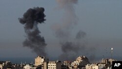 Smoke rises from an explosion following an Israeli airstrike in Gaza City, March 10, 2012.