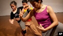 Choreographer Emmanuelle Phuong, dancers Chey Cankethea and Phon Sopheap, at the rehearsals of Khmeropédies II.