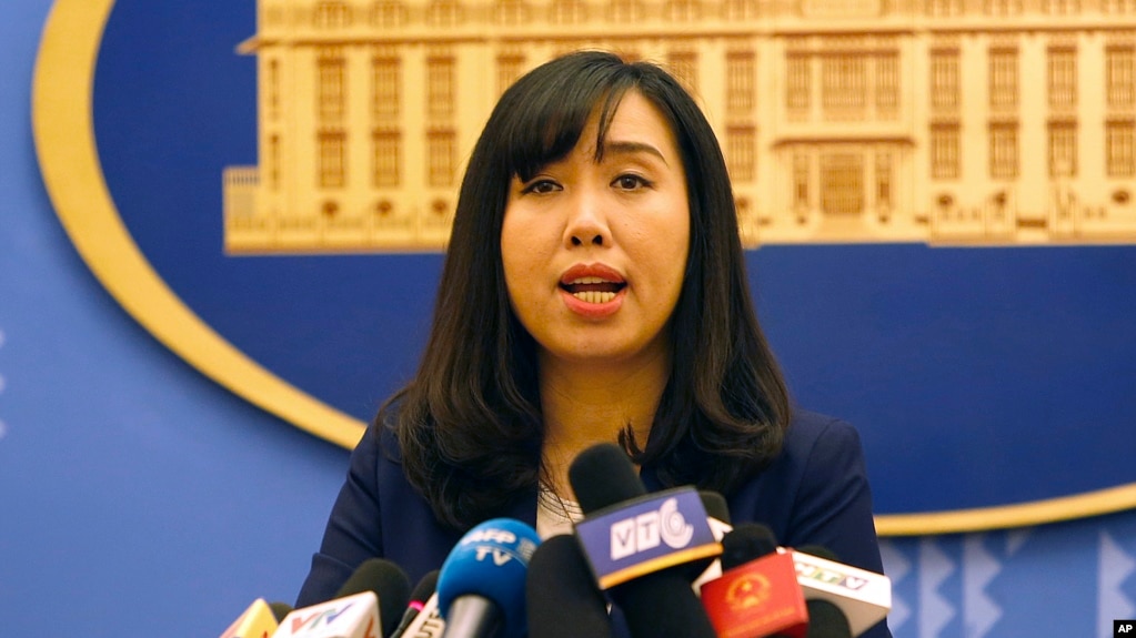 FILE - Vietnamese Foreign Ministry spokeswoman Le Thi Thu Hang speaks to reporters during a regular press briefing in Hanoi, Vietnam, Aug. 3, 2017. 