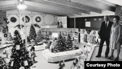 Wally Bronner and his wife, Irene, look over the holiday display at their CHRISTmas Wonderland store in the late 1940's. (Courtesy Bronner's)