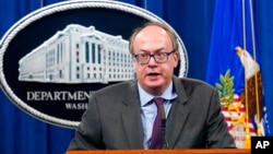 FILE - Jeff Clark, then-Assistant Attorney General for the Environment and Natural Resources Division, speaks during a news conference at the Justice Department in Washington, Sept. 14, 2020.