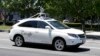 Google, Detroit Diverge on Road Map for Self-driving Cars