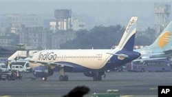 An IndiGo aircraft stands parked at Chhatrapati Shivaji airport in Mumbai, India, January 12, 2011