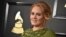 Adele arrives at the 59th annual Grammy Awards at the Staples Center, Feb. 12, 2017, in Los Angeles. 