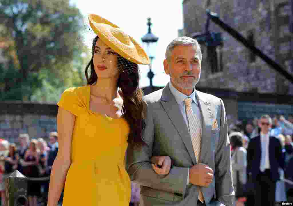 美國影星佐治古尼與太太抵達哈里王子和梅根&bull;馬克爾在溫莎鎮舉行的婚禮。 （2018年5月19日）