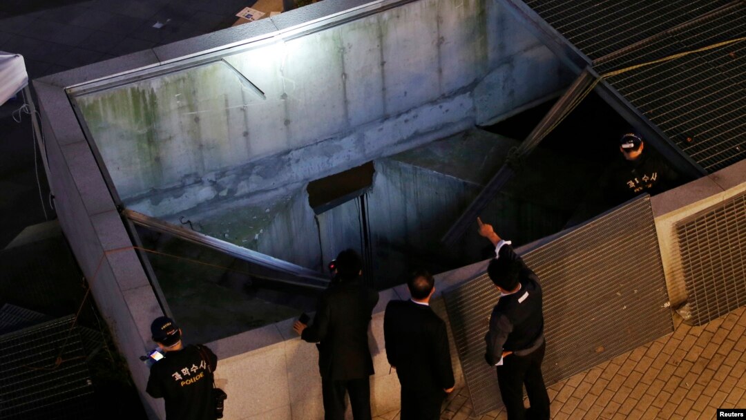 At least 14 concert-goers were killed in Seongnam, South Korea, when a ventilation shaft’s grate on which they were standing collapsed. Police officials inspect the scene Oct. 17, 2014.