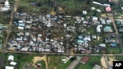 Damage to houses in Port Vila, Vanuatu is seen from the air in the aftermath of Cyclone Pam, March 16, 2015. 