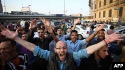 Des manifestants égyptiens sur la place Abdel Moneim Riad au Caire, le 5 décembre 2014.