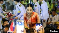 FILE - Thailand's Princess Bajrakitiyabha greets royalists, at The Grand Palace in Bangkok, Thailand, November 1, 2020. 