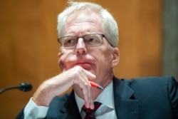 FILE - National Counterterrorism Center Director Christopher Miller testifies during a Senate Homeland Security and Governmental Affairs Committee hearing on Capitol Hill in Washington, Sept. 24, 2020.