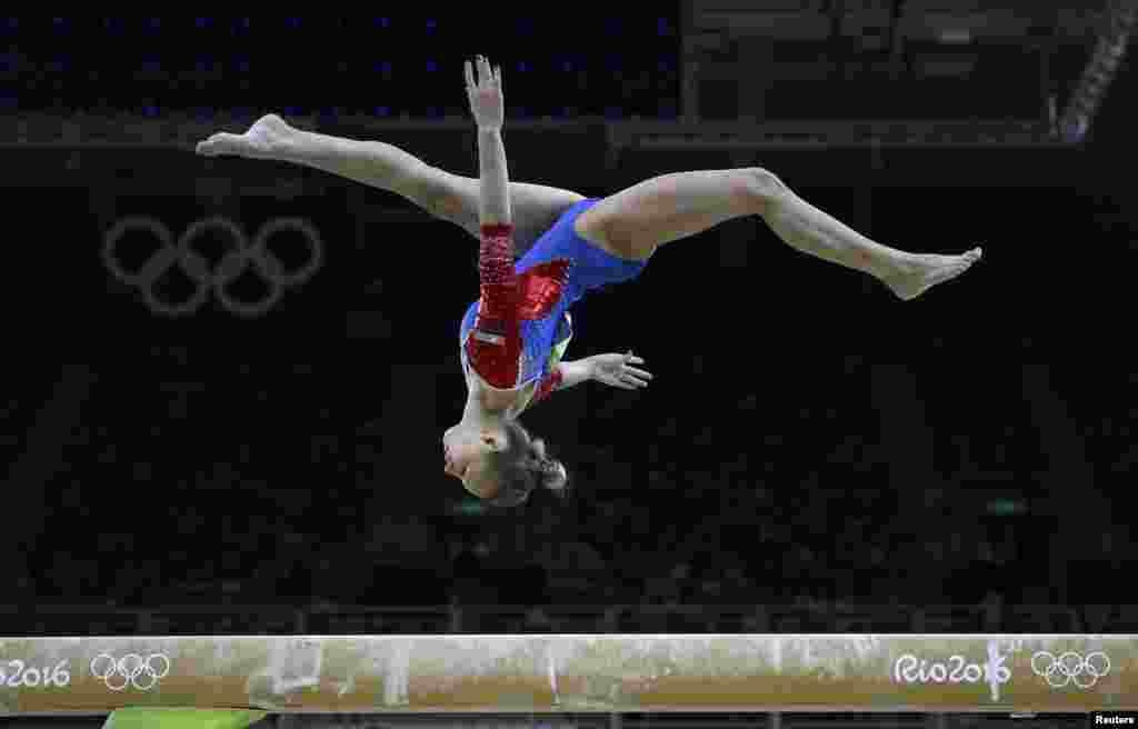 Daria Spiridonova of Russia competes on the balance beam during the women&#39;s qualifications.