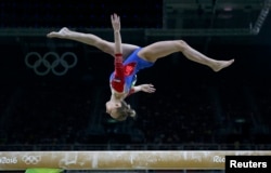 Daria Spiridonova (RUS) of Russia competes on the balance beam during the women's qualifications.