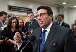 FILE - Jay Sekulow, President Donald Trump's personal lawyer, speaks to reporters during a break in the impeachment trial of the president on charges of abuse of power and obstruction of Congress, in Washington, Jan. 24, 2020.