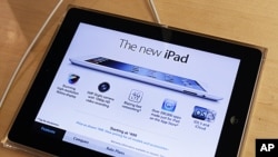 Apple's newest iPad is seen at the 5th Avenue Apple Store in New York, March 16, 2012.