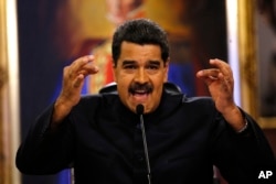 FILE - Venezuela's President Nicolas Maduro gives a news conference in Caracas, Venezuela, June 22, 2017.