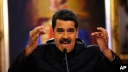 FILE - Venezuela's President Nicolas Maduro gives a news conference in Caracas, Venezuela, June 22, 2017.