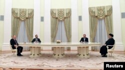 Russian President Vladimir Putin attends a meeting with his Iranian counterpart, Ebrahim Raisi, in Moscow, January 19, 2022. (Reuters)