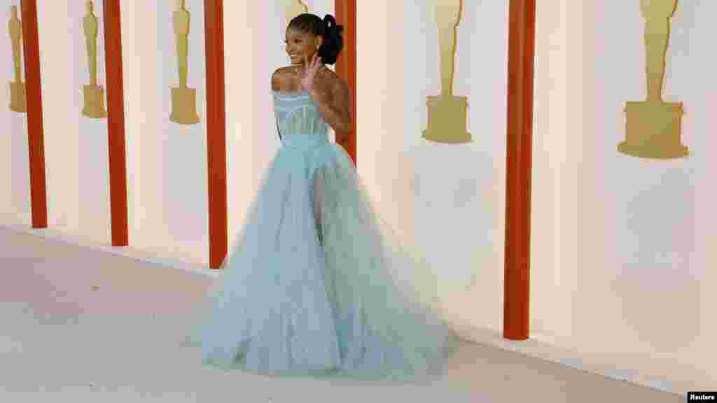 Halle Bailey poses on the champagne-colored red carpet during the Oscars arrivals at the 95th Academy Awards in Los Angeles, March 12, 2023. (Photo by Eric Gaillard/Reuters)