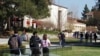 In this Feb. 2, 2012, photo, students walk through the campus of Claremont McKenna College in Claremont, Calif.