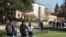 In this Feb. 2, 2012, photo, students walk through the campus of Claremont McKenna College in Claremont, Calif.