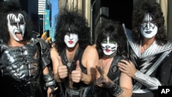 FILE - KISS band members from left: Gene Simmons, Paul Stanley, Eric Singer, Tommy Thayer arrive at SiriusXM offices to promote their latest release, "Monster," in New York.