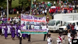 Kenyan workers march during the Labor Day Celebration Parade at Uhuru Park, Nairobi, Kenya, May 1, 2017.