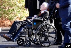 FILE - Former President Jimmy Carter departs after attending the funeral service for his wife, former first lady Rosalynn Carter, at Maranatha Baptist Church, in Plains, Ga., November 29, 2023.