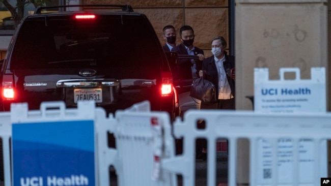 FILE - Former first lady and former U.S. Secretary of State Hillary Clinton arrives at the University of California Irvine Medical Center in Orange, Calif., Oct. 17, 2021.