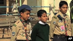 Libyan Boy Scouts, just a few of around 3,500 in the town of Benghazi, are organized and able, 7 March 2011