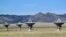 FILE - This Feb. 10, 2017, photo shows a few of the radio antennas that make up the Very Large Array astronomical observatory, which are positioned on tracks on the Plains of San Augustin west of Socorro, N.M. 