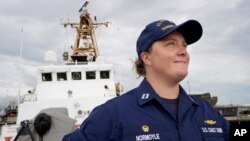 U.S. Coast Guard Lt. Kelli Normoyle, Commanding Officer of the Coast Guard Cutter Sanibel, stands for a photograph on the deck of the vessel, at a shipyard in North Kingstown, Rhode Island, Sept. 16, 2021. 