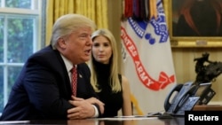 U.S. President Donald Trump and his daughter Ivanka hold a video conference call from the Oval Office of the White House.