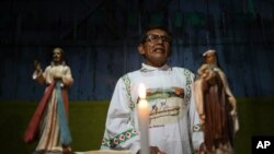 Catholic missionary Antelmo Pereira, 61, leads a prayer service in Santa Rosa, Brazil, Sept. 21, 2019.