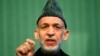 FILE - Afghan President Hamid Karzai speaks during a news conference in Kabul, Jan. 25, 2014. 